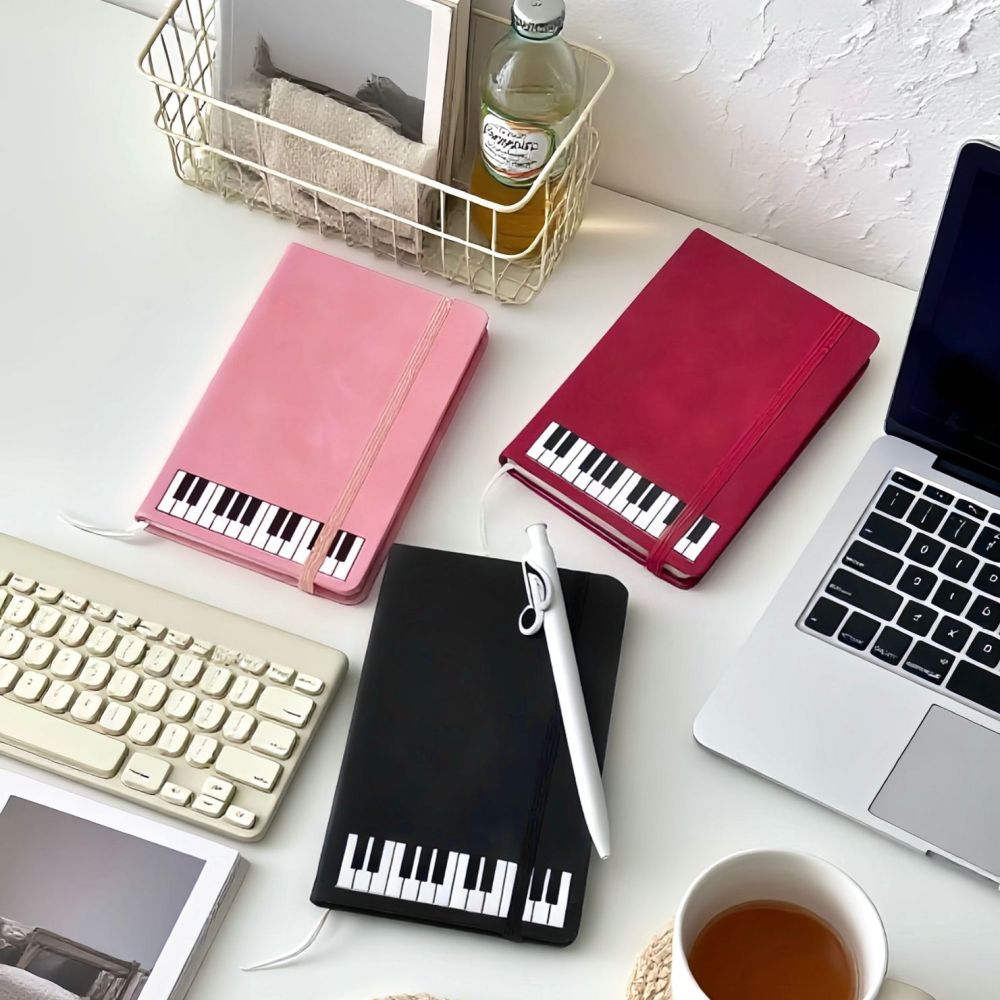 Notizbuch mit Musikthema Klavi – Blank Sheet Music Notebook Bewertung und Preis